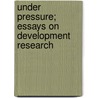 Under pressure; essays on development research by Unknown