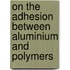 On the adhesion between aluminium and polymers