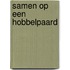 Samen op een hobbelpaard