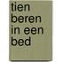 Tien beren in een bed