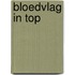 Bloedvlag in top