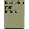 Knutselen met letters door V. Guillaume