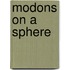 Modons on a sphere