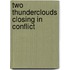 Two thunderclouds closing in conflict