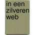 In een zilveren web