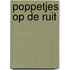 Poppetjes op de ruit