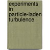 Experiments in particle-laden turbulence by C. poelma