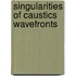 Singularities of caustics wavefronts