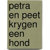 Petra en peet krygen een hond door Piet Bakker