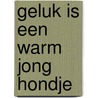 Geluk is een warm jong hondje by Paul A. Schultz