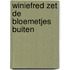 Winiefred zet de bloemetjes buiten