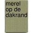 Merel op de dakrand
