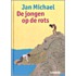De jongen op de rots