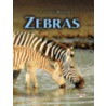 Zebras door Lynn M. Stone