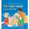 Een stapel dozen en een nieuw huis