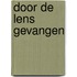Door de lens gevangen