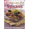 Koken op z'n Spaans by J. Huisman