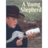A Young Shepherd door Cat Urbigkit