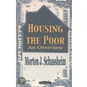 Housing The Poor by Morton J. Schussheim