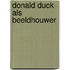 Donald duck als beeldhouwer