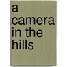 A Camera In The Hills by Roly Smith