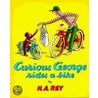 Curious George Rides a Bike door Margret H.A. Rey