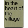In The Heart Of The Village door Barbara Bash