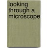 Looking Through a Microscope door Linda Bullock