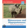 Rhinoceroses And Hippopotami door Michael Pelusey