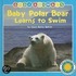 Baby Polar Bear Learns to Swim