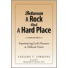 Between A Rock And A Hard Place by Yakisha T. Simmons