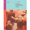 Explaining in the Primary School door George Brown