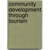 Community Development Through Tourism door Sue Beeton