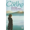 Sur le bord de la rivière Piedra je me suis assis et j'ai pleuré door Paulo Coelho