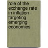Role of the Exchange Rate in Inflation - Targeting Emerging Economies door Scott Roger