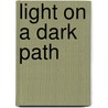 Light On A Dark Path door Alida W. Graves