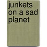 Junkets On A Sad Planet door Tom Clark