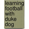 Learning Football With Duke Dog door Sarah Marshall