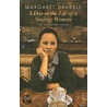 A Day In The Life Of A Smiling Woman door Margaret Drabble