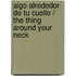 Algo Alrededor De Tu Cuello / The Thing Around Your Neck