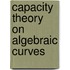 Capacity Theory on Algebraic Curves