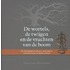De wortels, de twijgen en de vruchten van de boom