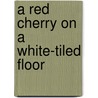 A Red Cherry On A White-Tiled Floor door Maram Misri