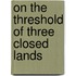 On the Threshold of Three Closed Lands