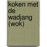 Koken met de wadjang (wok) by B. Jones