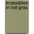 Krokodillen in het gras