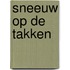 Sneeuw op de takken