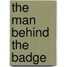 The Man Behind the Badge by Vickie Taylor