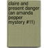Claire and Present Danger (An Amanda Pepper Mystery #11)