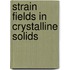 Strain fields in crystalline solids